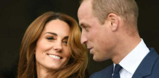 Man and woman smiling and talking facing each other