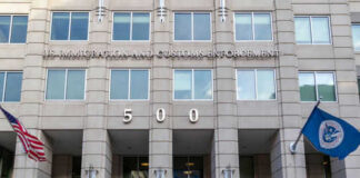 US Immigration and Customs Enforcement building entrance flags