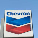Massive Corporate Flight: California’s $108B Loss Chevron logo sign against blue sky