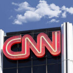 CNN building sign and blue sky background