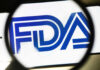 Senator’s Legislation Shakes Up FDA Authority FDA logo under a magnifying glass.
