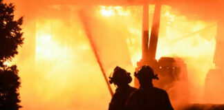 Firefighters battling intense blaze at night