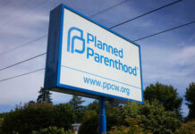 Planned Parenthood sign with website and logo displayed