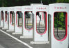 Tesla charging stations lined up in a row