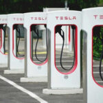 Tesla charging stations lined up in a row