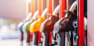 Colorful fuel nozzles at a gas station