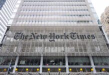 Facade of The New York Times building with large lettering