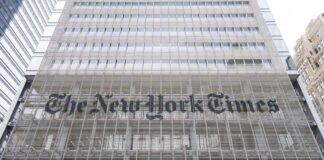 Facade of The New York Times building with large lettering