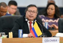 Colombian representative speaking at a political conference