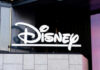 Disney logo on building exterior.