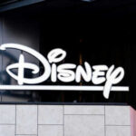 Disney logo on building exterior.