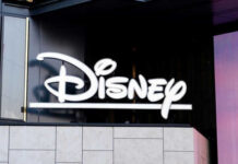 Disney logo on building exterior.