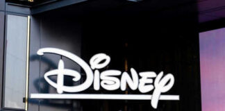 Disney logo on building exterior.