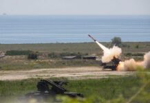Surface-to-air missile launching from a coastal battery