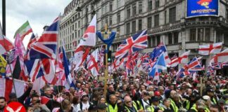 Tommy Robinson’s Unite the Kingdom marchers fill central London streets