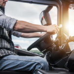 Breaking: Knifepoint Hijacking Highlights Urban Crime Crisis A truck driver gripping the steering wheel inside a vehicle cabin