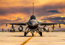 Laser Strikes on F-16s: Who’s Behind It? F-16 fighter jet on an airbase during sunset