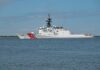 A U.S. Coast Guard patrol vessel sailing on calm waters