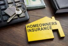 Homeowners insurance document with keys and calculator