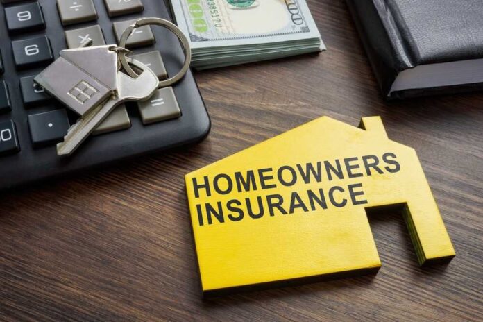 Homeowners insurance document with keys and calculator