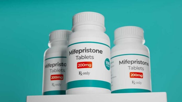 Bottles of Mifepristone tablets on a shelf
