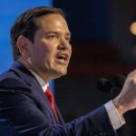 Iran Talks: Rubio Warns Against Premature Celebration A politician passionately delivering a speech at a podium