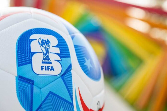 shutterstock_2657074811.jpg Close-up of a FIFA World Cup soccer ball with a colorful background