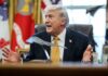 Donald Trump speaking animatedly in the Oval Office