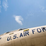 Close-up view of a U.S. Air Force aircraft against a blue sky