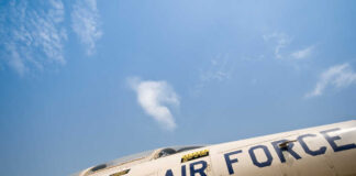 Close-up view of a U.S. Air Force aircraft against a blue sky