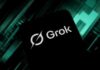 A Pentagon Revelation Raises New Questions Smartphone screen displaying the Grok logo on a dark tech-themed background