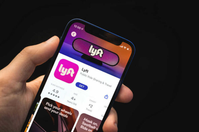 483100174 Lyft app page open on a smartphone.