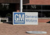 General Motors sign outside a brick building