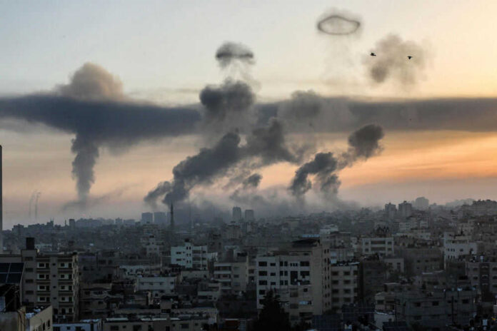 City skyline with rising smoke and birds in sky.