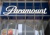 Price Hike Warning Hits Paramount–Warner Deal Paramount sign displayed on a building exterior