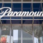 Price Hike Warning Hits Paramount–Warner Deal Paramount sign displayed on a building exterior