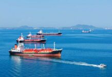Why Tehran Keeps Playing The Same Game Several cargo ships navigating in a calm ocean