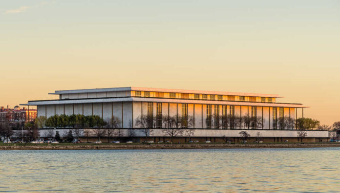 Washington,-,December,16:,The,John,F.,Kennedy,Center,For Modern riverside performing arts center at sunset