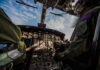 Drone Ambush Claims Apache — Consequences Coming Interior view of a helicopter cockpit with pilots operating controls