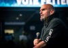 Fetterman’s Criticism Sparks New Democratic Rift Man speaking into microphone on stage.