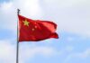 China’s Nuclear Sprint Is Raising Alarm Chinese national flag waving on a flagpole