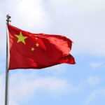 China’s Nuclear Sprint Is Raising Alarm Chinese national flag waving on a flagpole