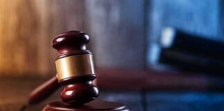 Judge's gavel resting on wooden block
