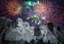 A Historic Landmark, A Powerful Message Fireworks exploding over Mount Rushmore at night