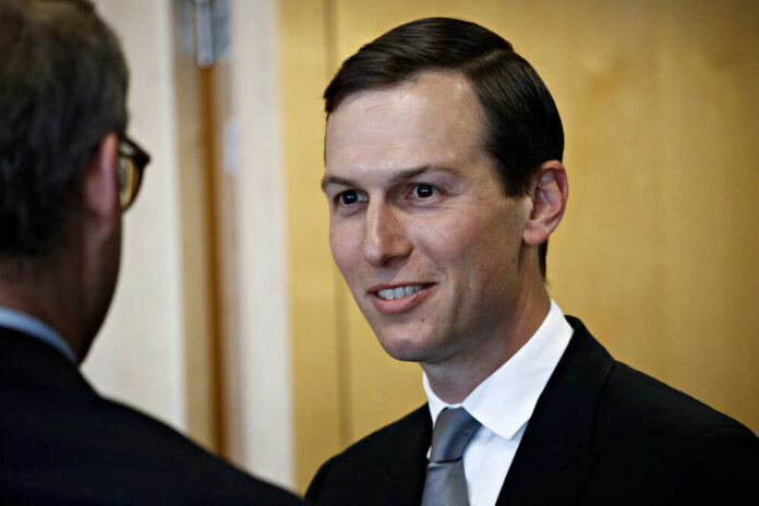 Brussels,,Belgium.,4th,June,2019.,Jared,Kushner,,Special,Advisor,To A man in a suit smiling while engaging in conversation indoors