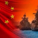 Chinese Vessel Confronts Philippine Patrol Near Shoal Chinese flag overlaid on warships at harbor during sunset