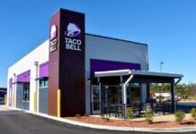 FDA Quietly Walks Back A Major Food Scare Taco Bell restaurant exterior with drive-thru and patio seating