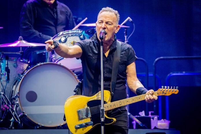 25,May,2023.,Johan,Cruijf,Arena,Amsterdam,,The,Netherlands.,Concert A musician passionately performing on stage with a guitar