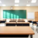 Judge Slams Graded Kisses — Parents Furious Empty classroom with desks, a green chalkboard, and natural light