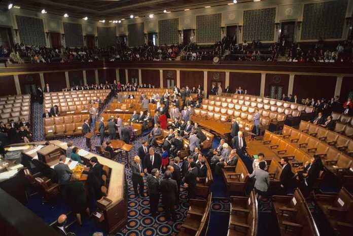 shutterstock_1082050127 Legislative chamber with members gathering on the floor